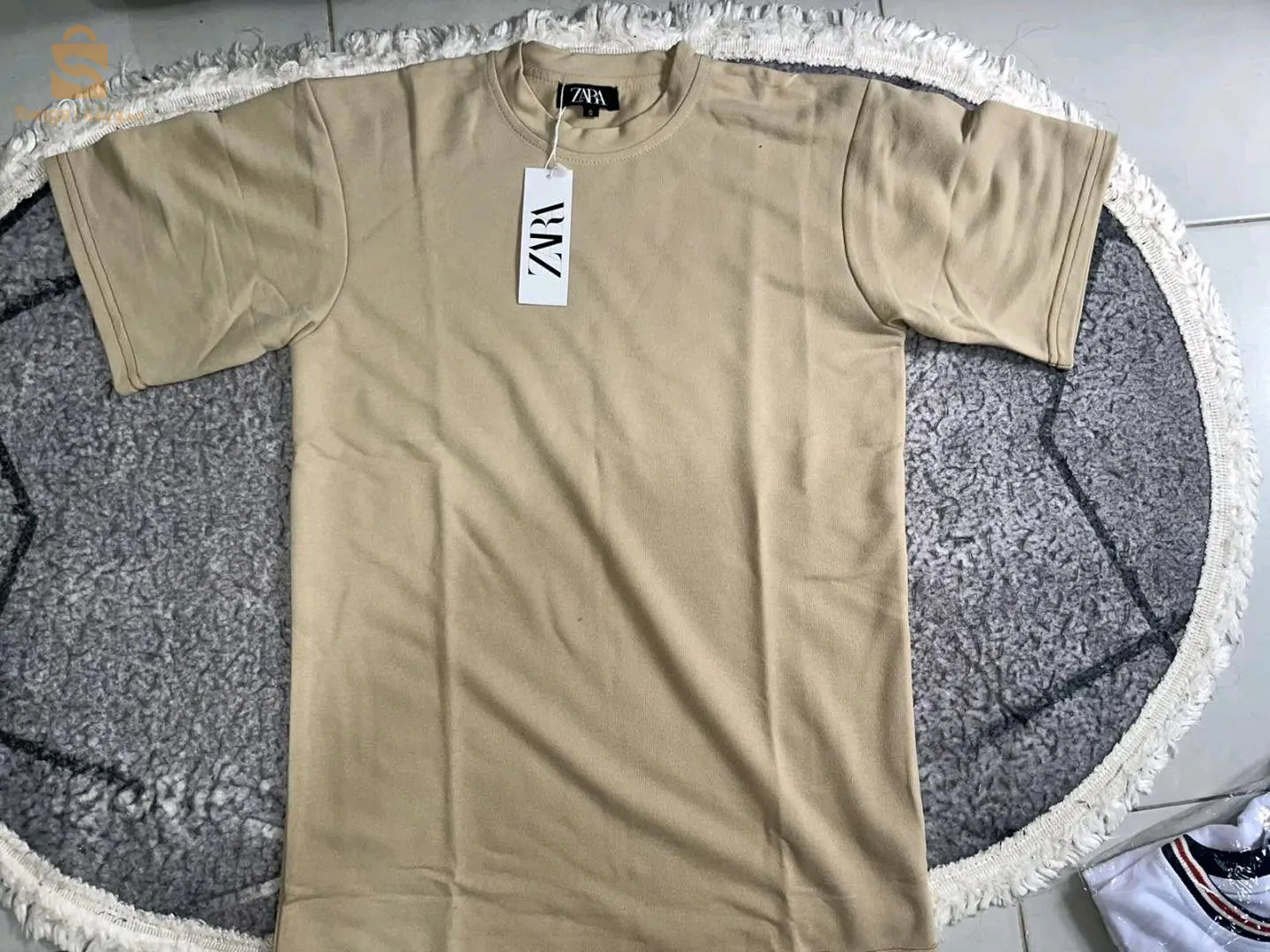 أقمصة رجالية و سراويل صيفية متوفرة جملة و بلحبة