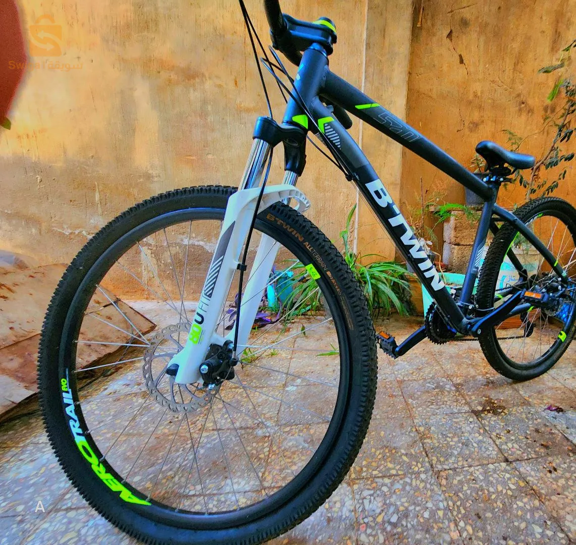 B.TWIN ROCKRIDER 520 jdida