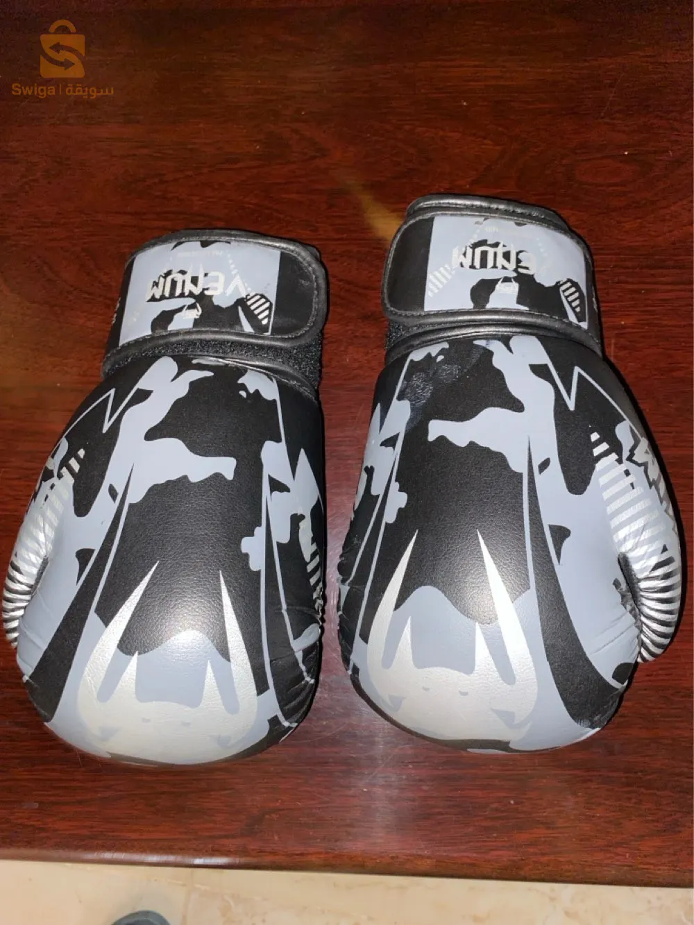 Les Gants de boxe avec des proteges tibia