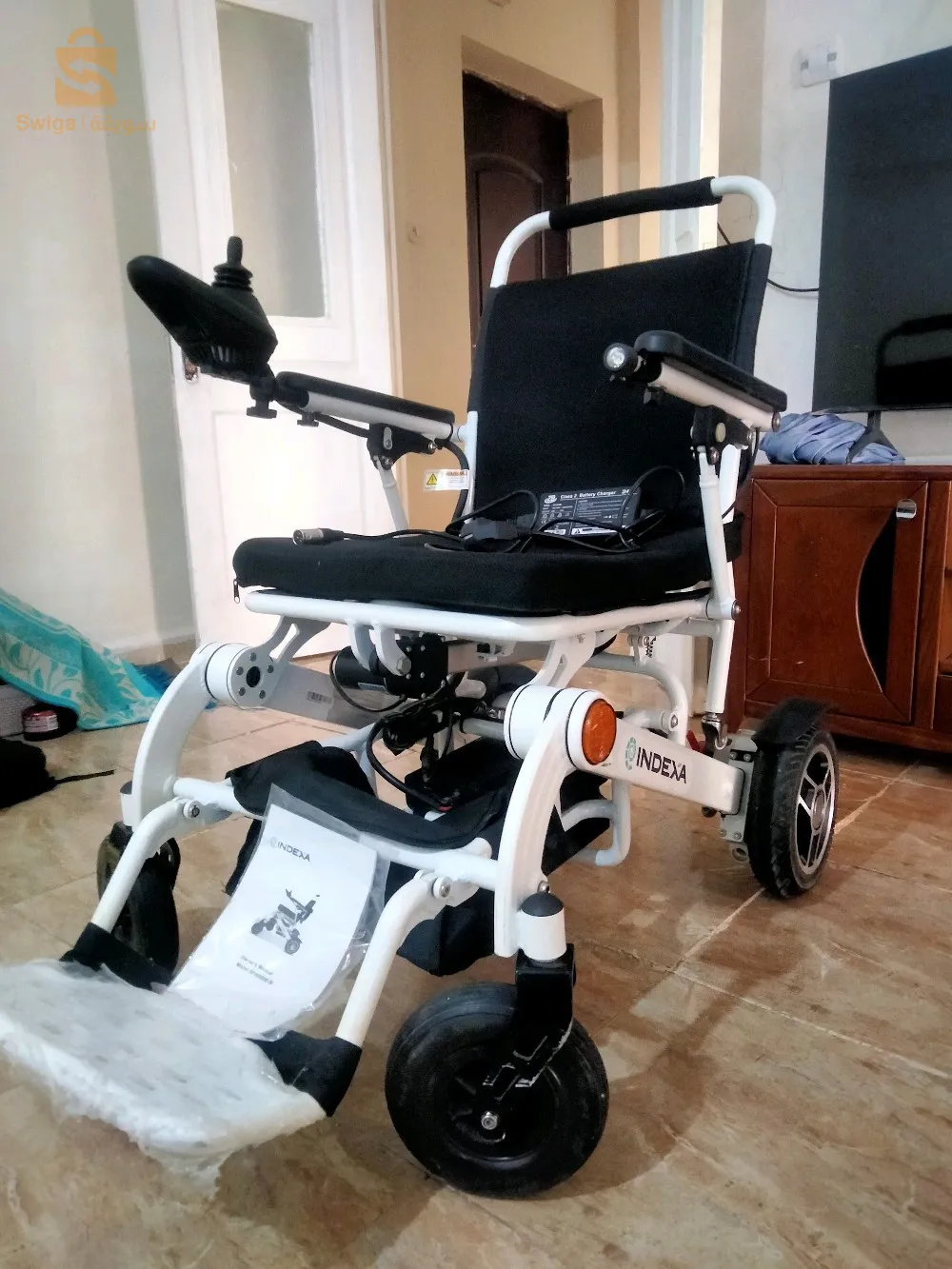 كرسي كهربائي متحرك