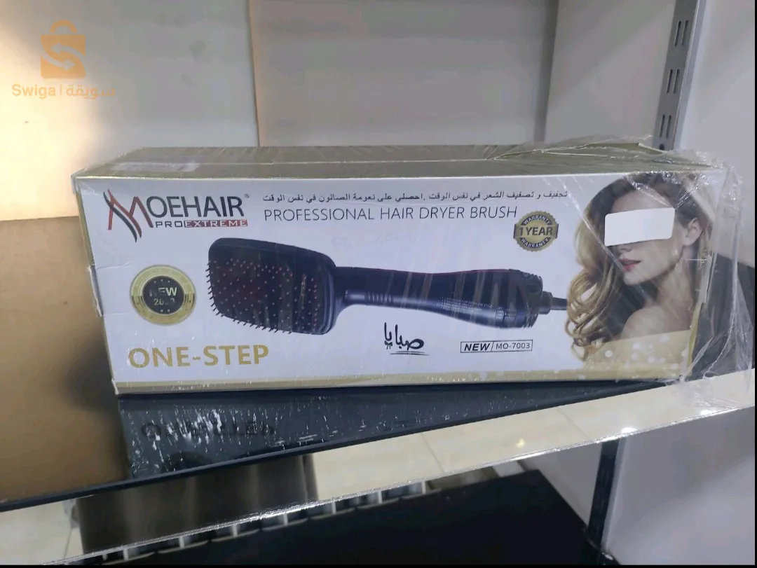 مشط كهربائي يعمل لترطيب الشعر