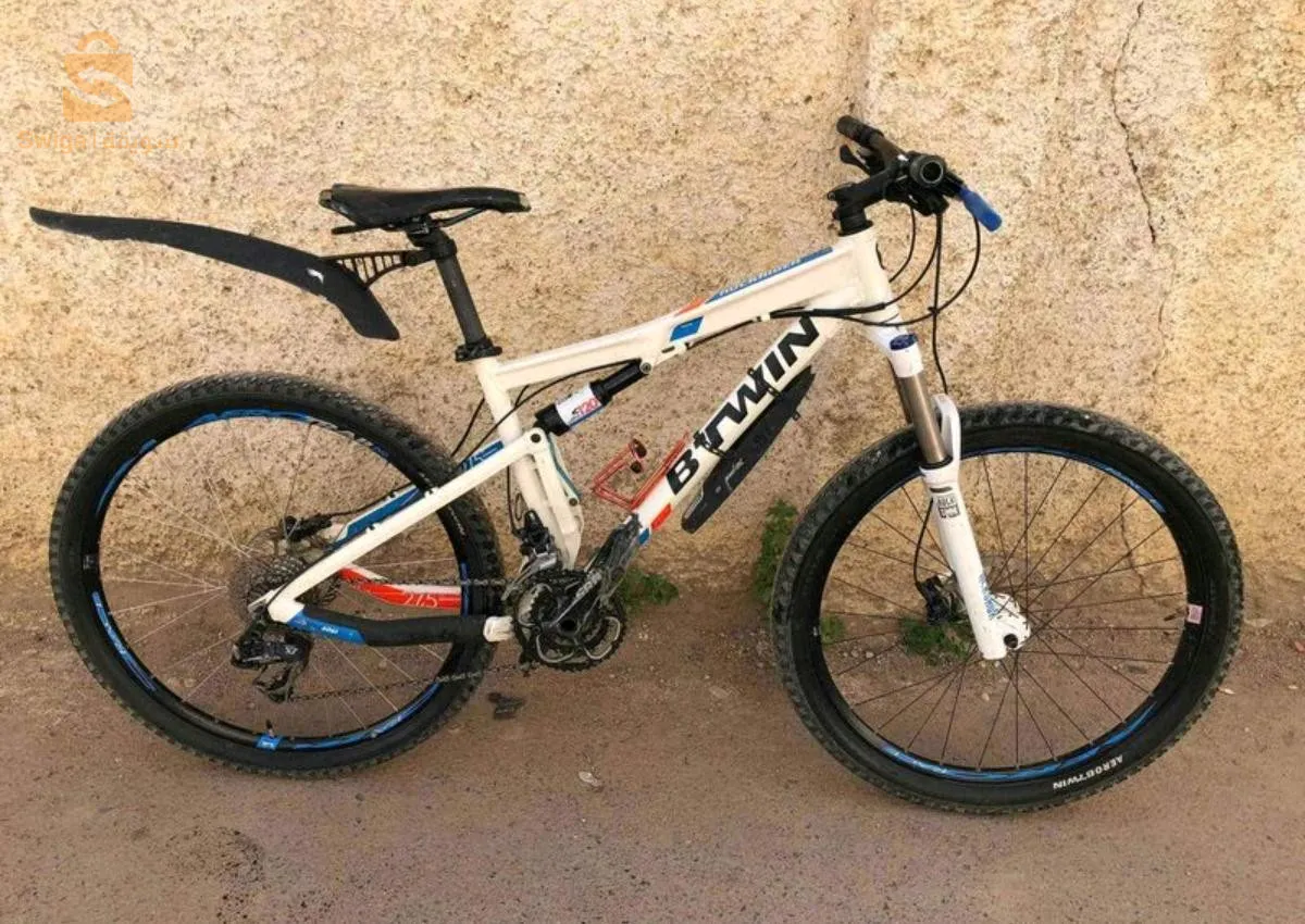 Velo rockrider bzaaf toop fran lokid duble amortiseur f rock chok haja tae jebal