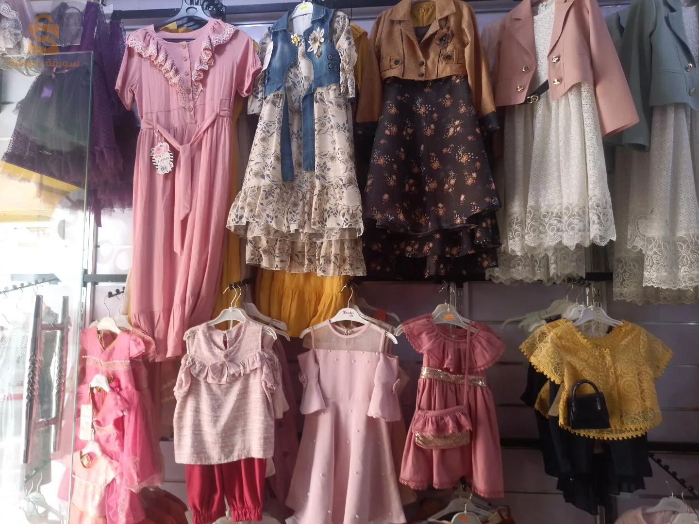 تفريغ محل ملابس اطفال