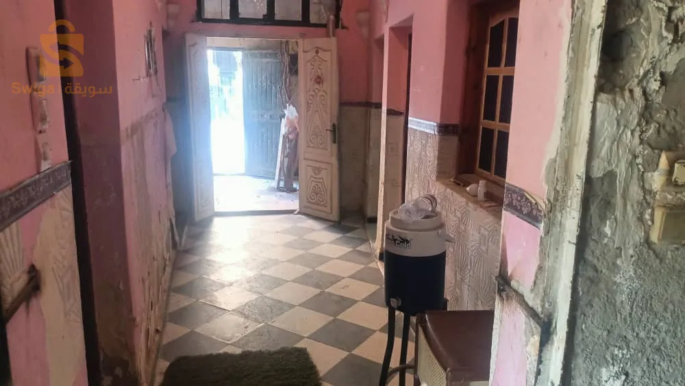 Il se rendit à Bab al-Fath avec l'entrée