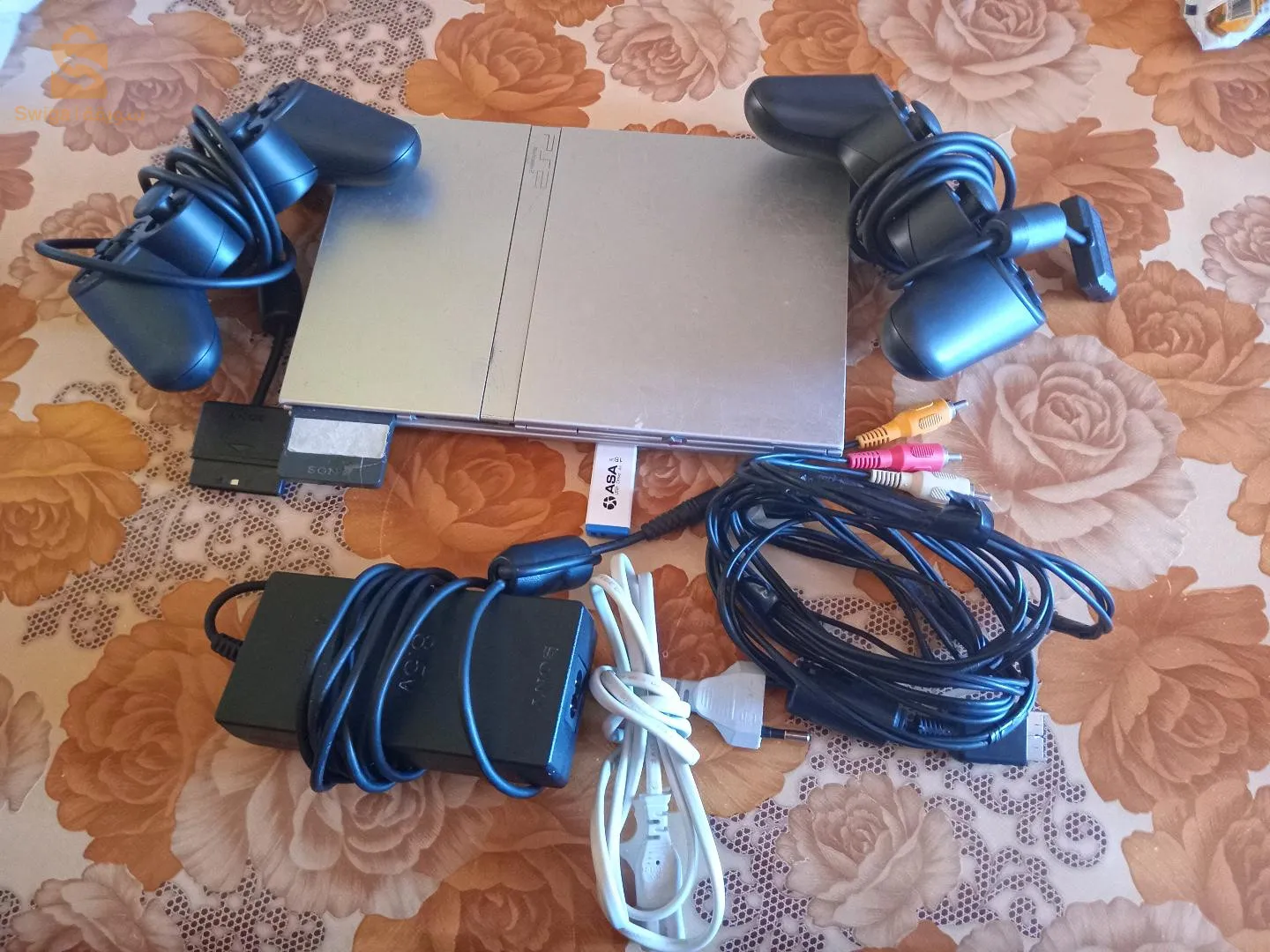 بلايستيشن 2مفلاشي وفيه 22لعبة