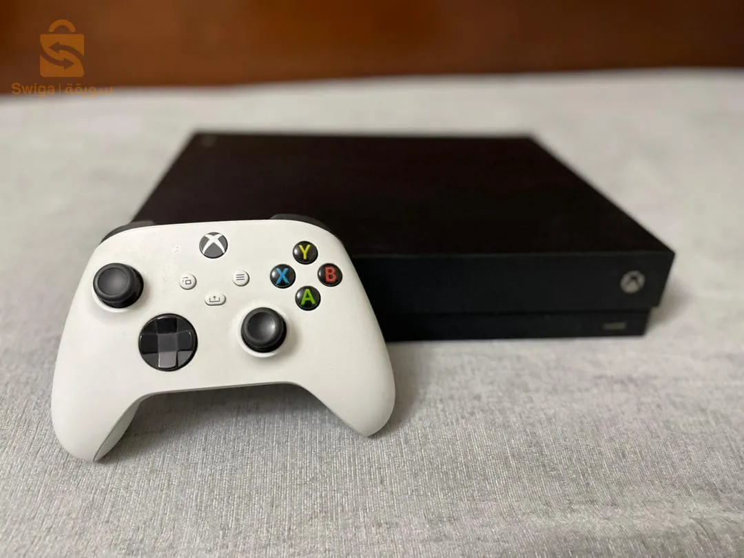 Xbox one X 1 tr avec manette de series S
