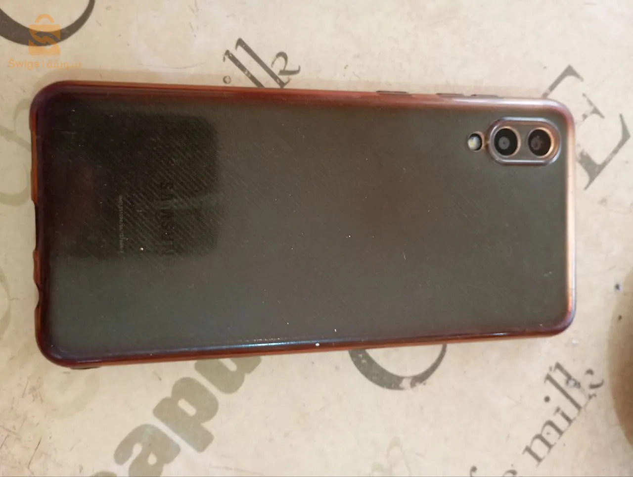Phone for sale with a small crack in the screen