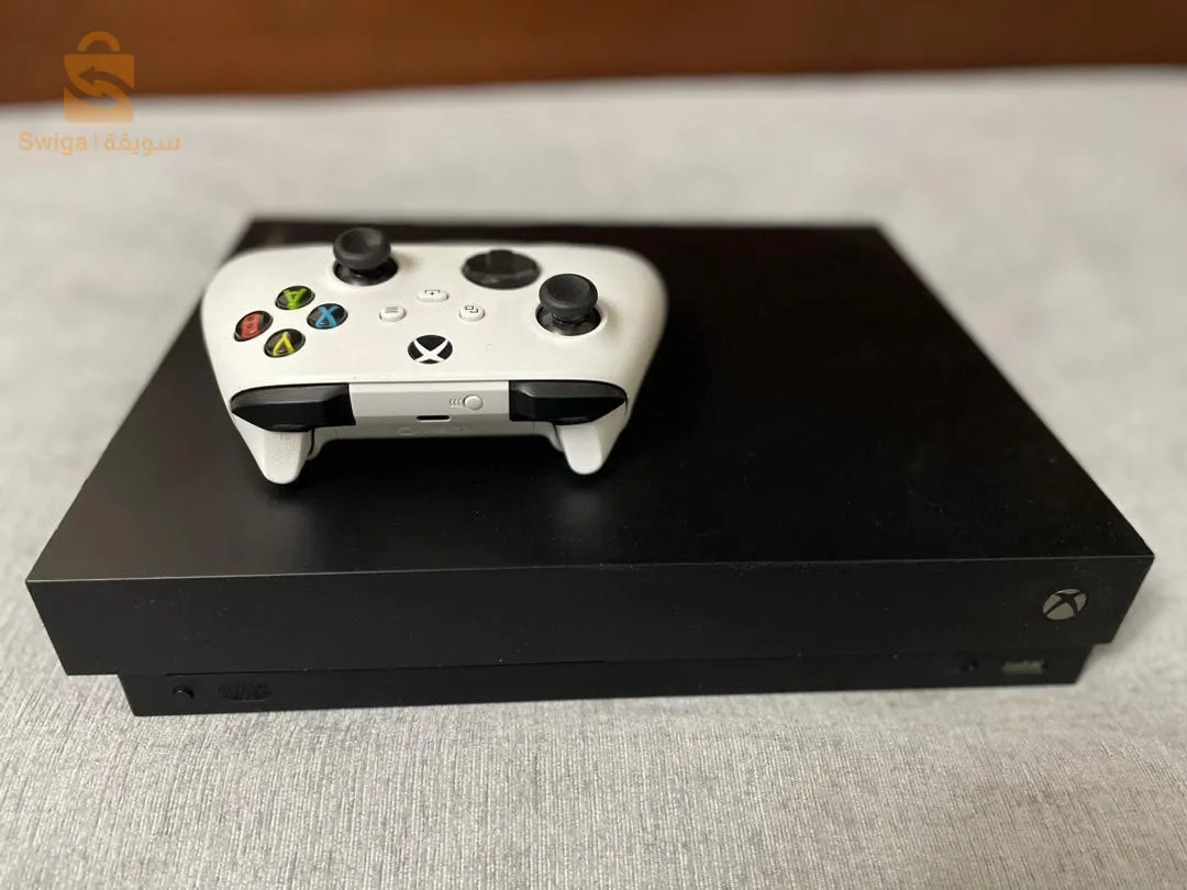 Xbox one X 1 tr avec manette de series S
