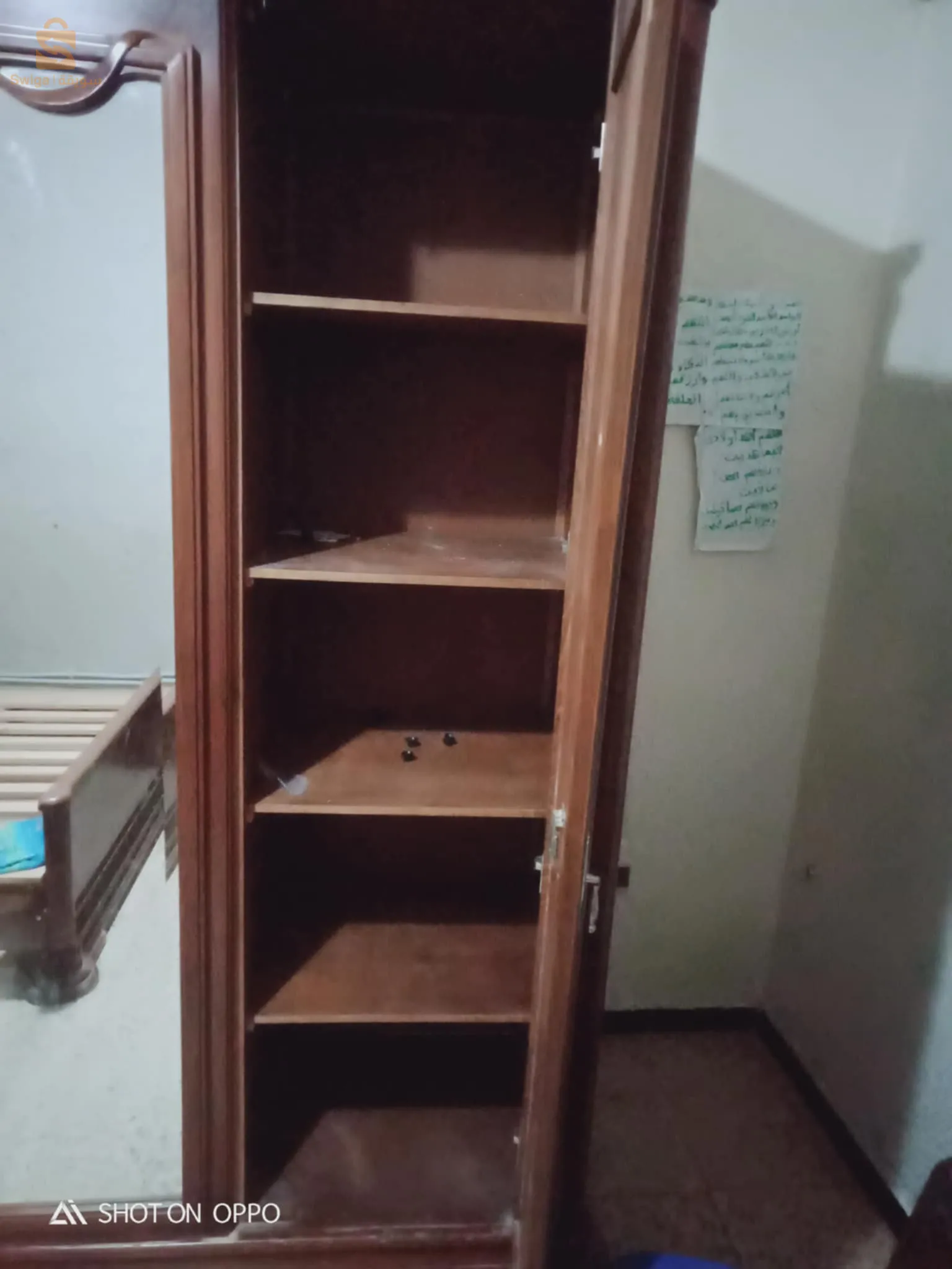 A bedroom dressed in wood hugs and also with a marble in the dressing table and everything!!!