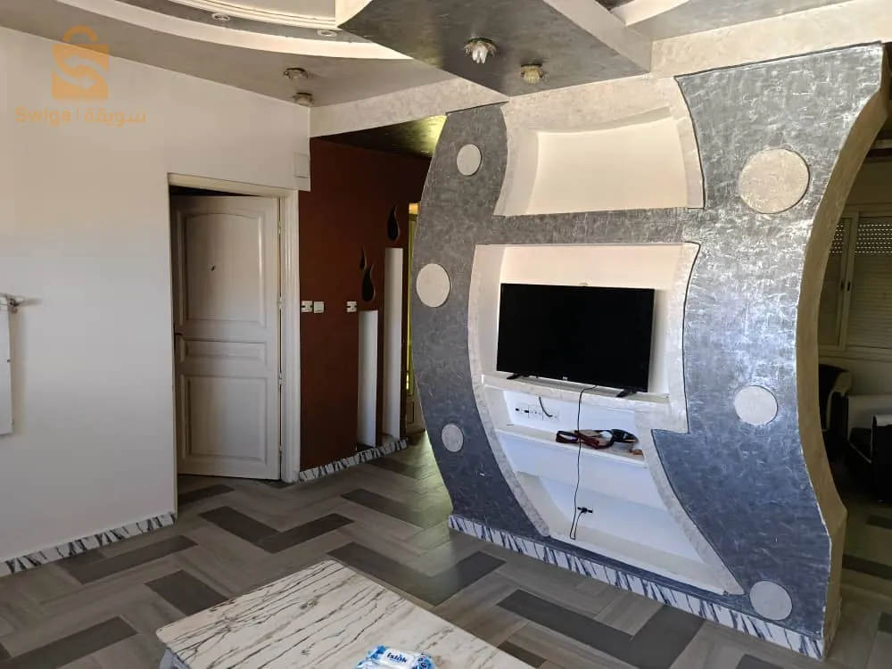 Vend très jolie app haute standing au centre de bouira à côté de l'université