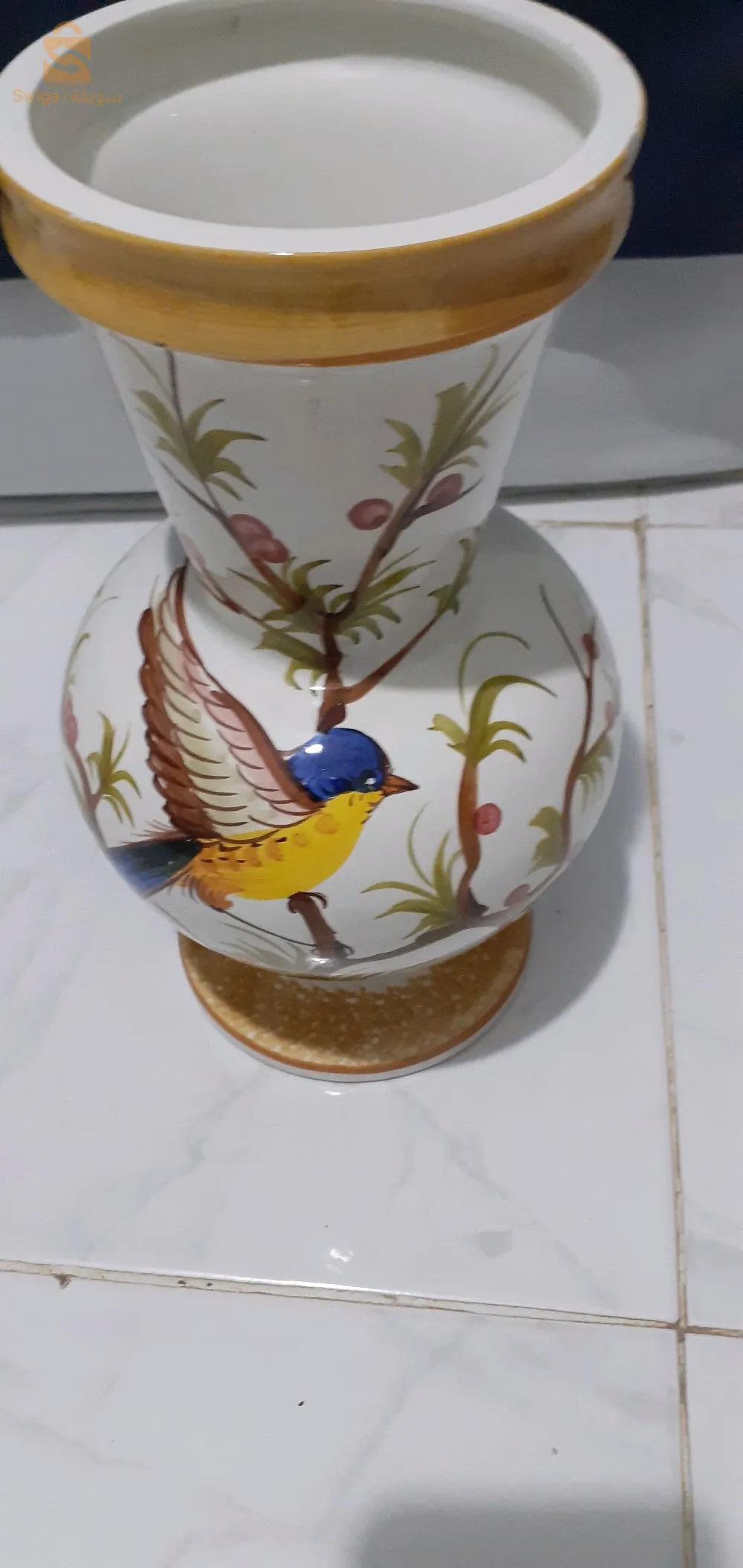 trés jolie vase à fleurs