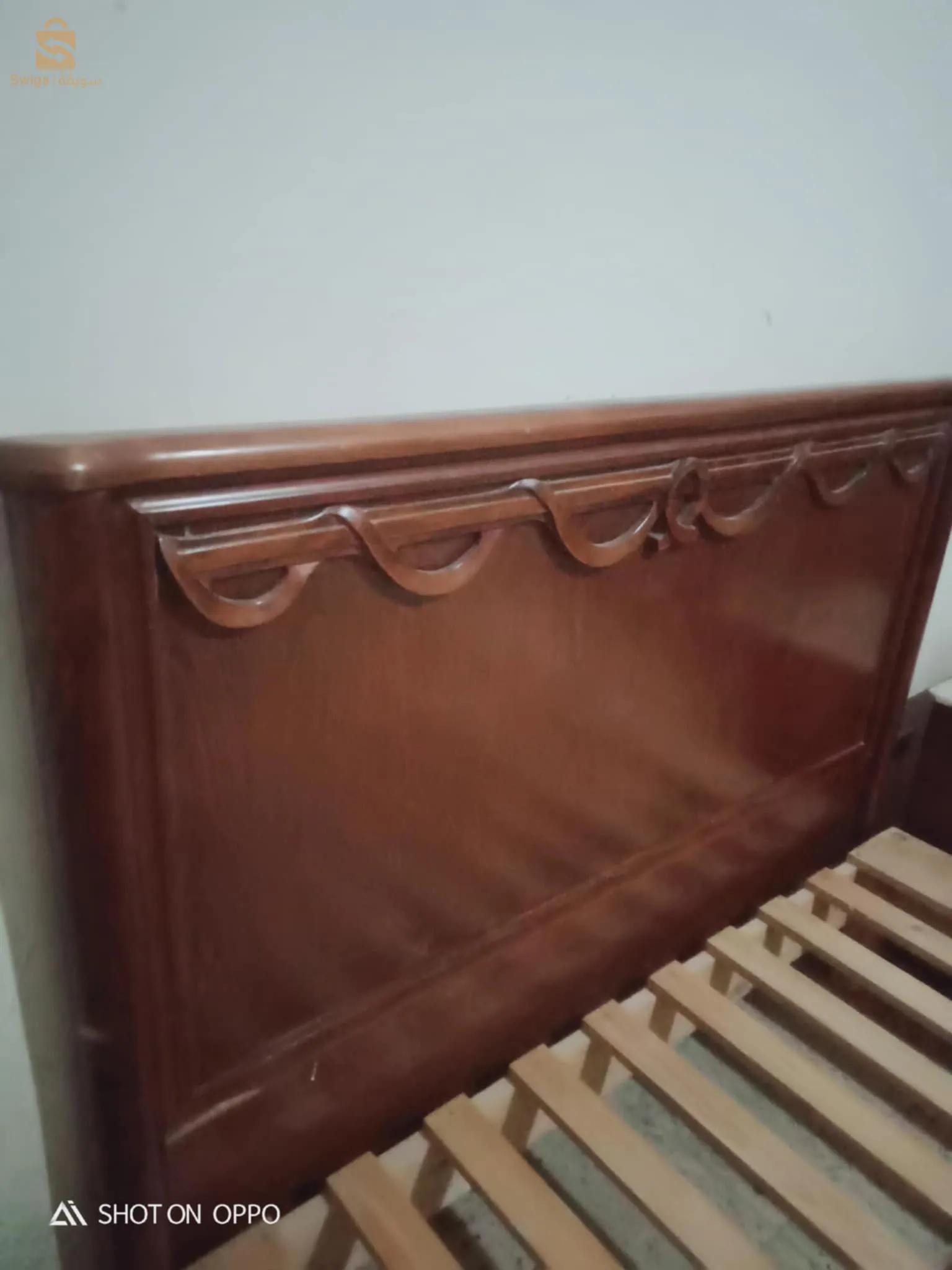 A bedroom dressed in wood hugs and also with a marble in the dressing table and everything!!!