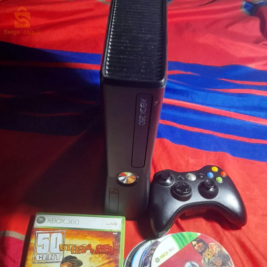 Xbox 360 slim 
Jdida w n9iya
Les cables ✅️
30 jeux ✅️
Des cd✅️
(avec 1 mannete =16000 da /avec 2 mannete =19000 da)