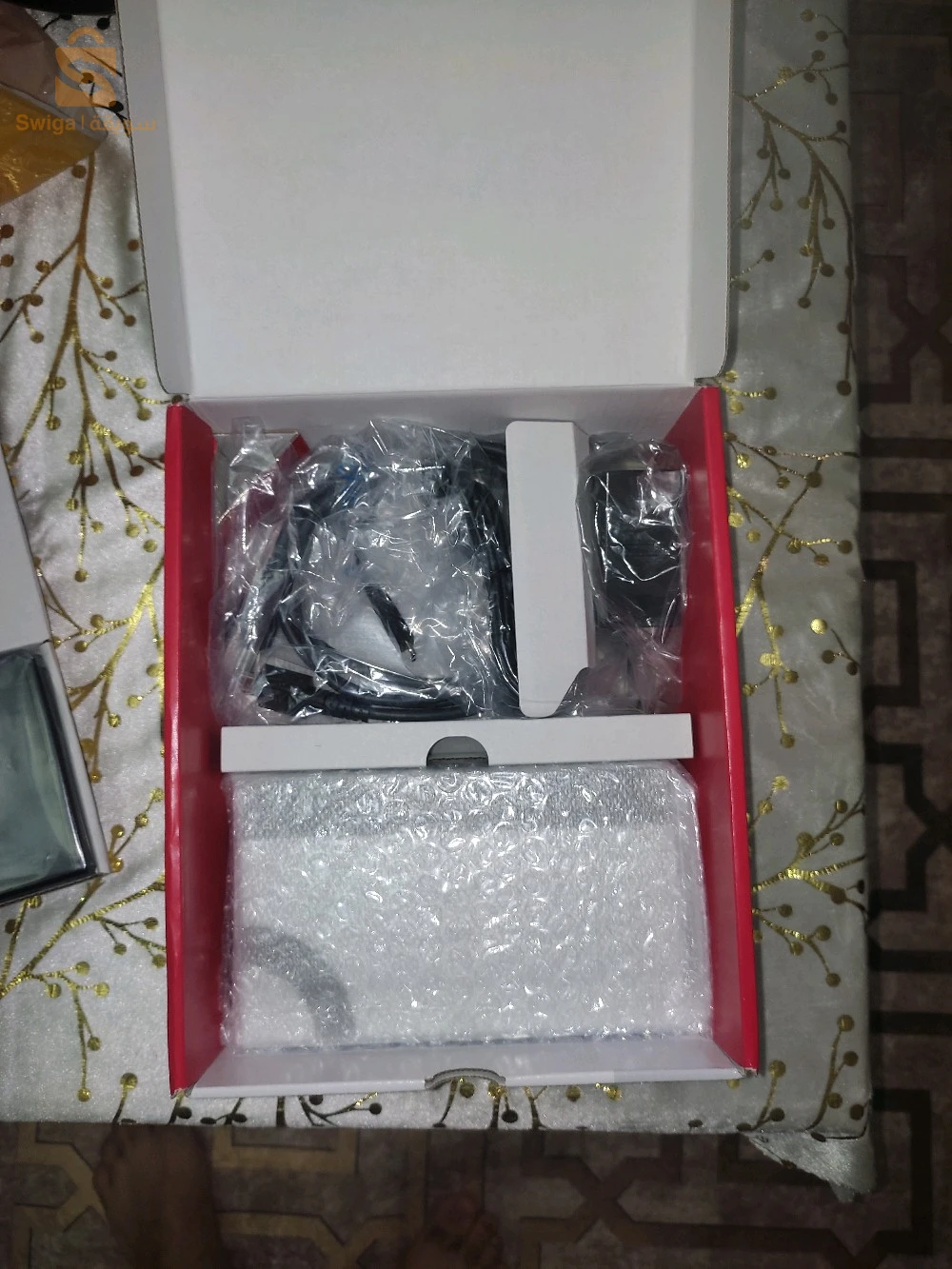 nitendo Switch Oled jamais utilisé avec cassette Zelda et pochette original