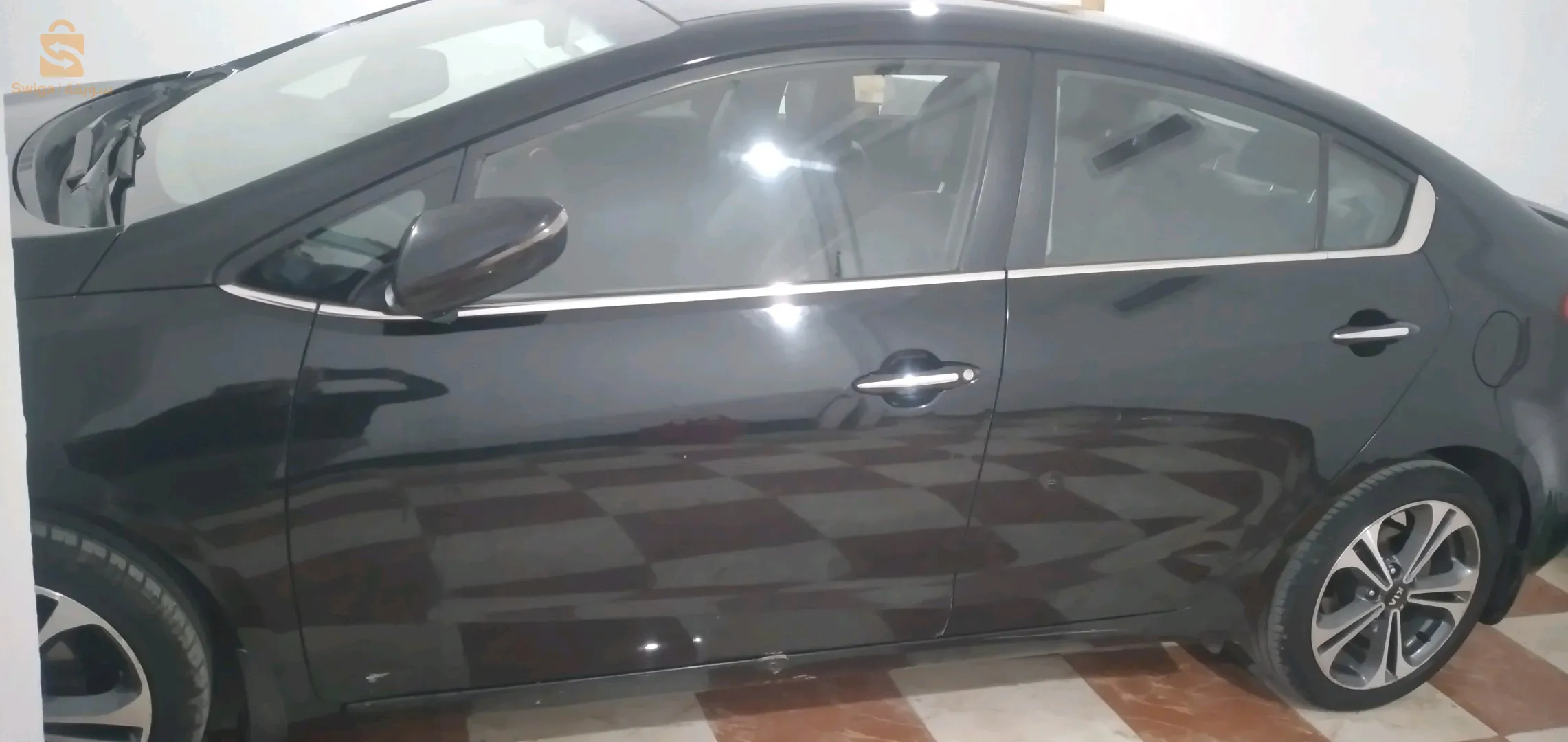 Kia Cerato deuxième main,  très Propre juste par-Choc,  0 peinture,  Clim Marche,  suspension magnifique,  0 choc,  ماشاء الله