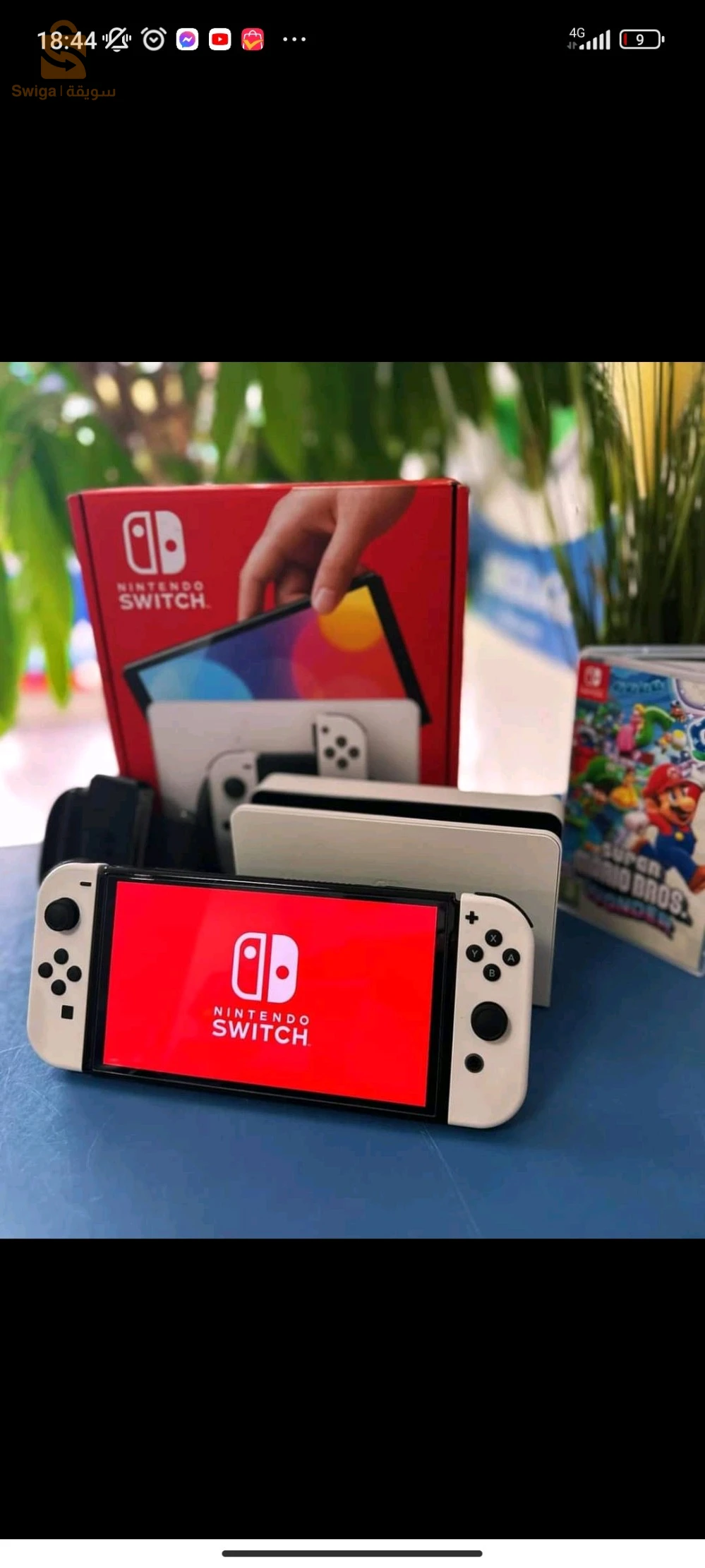 nitendo Switch Oled jamais utilisé avec cassette Zelda et pochette original