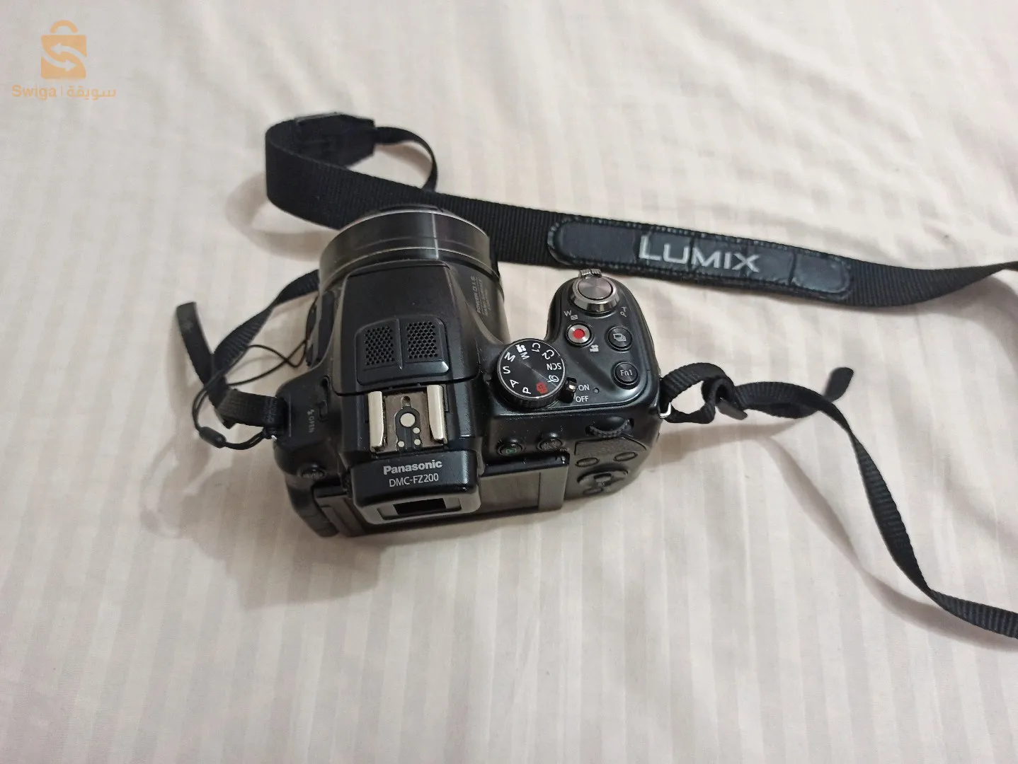 lumix fz200 في حالة جيدة مع بطاريتين وشاحن أصلي