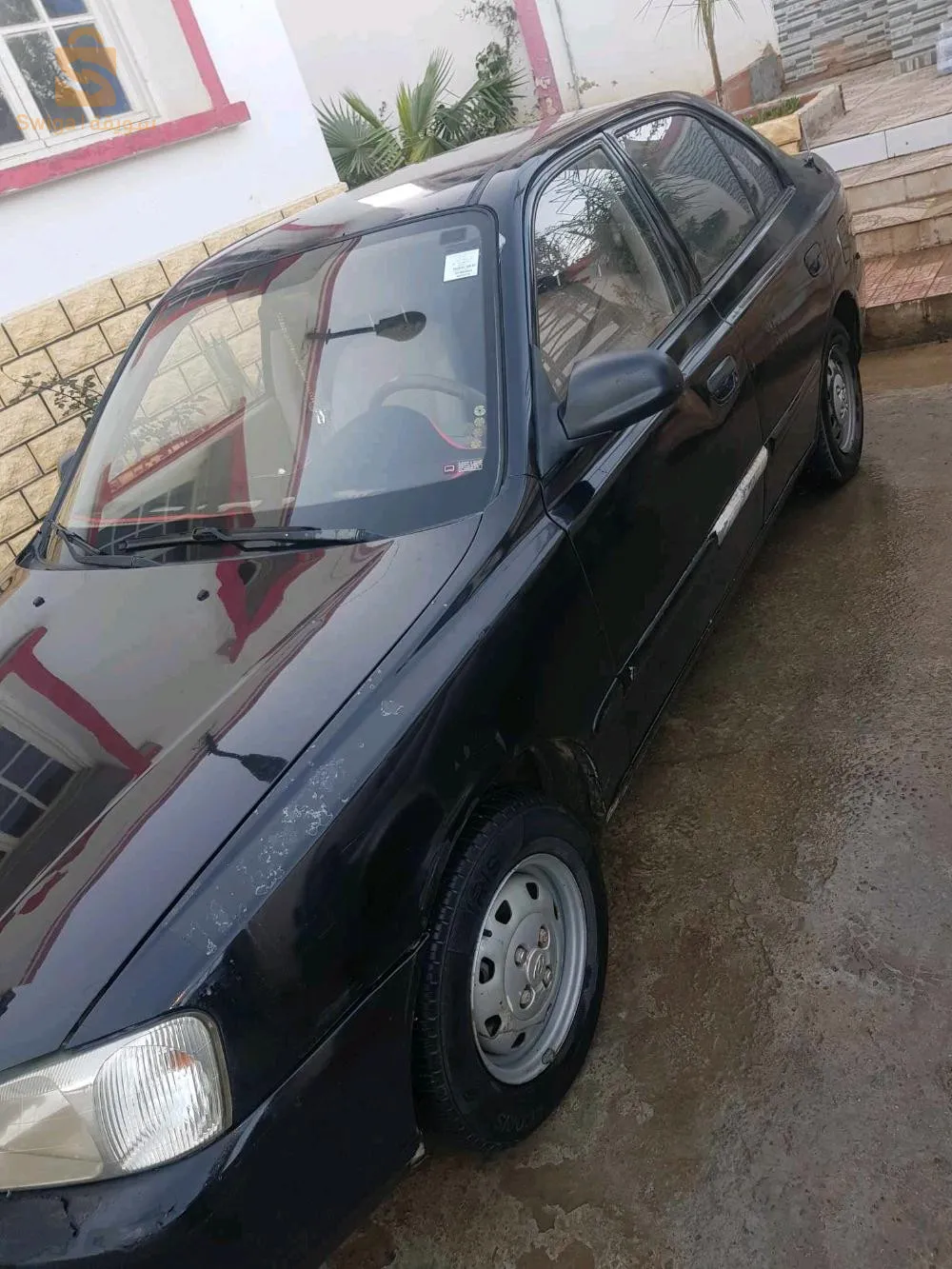 fiha côté chofeur walat 3liha romorka ta3 tracteur 3la bara 
les deux parchoque