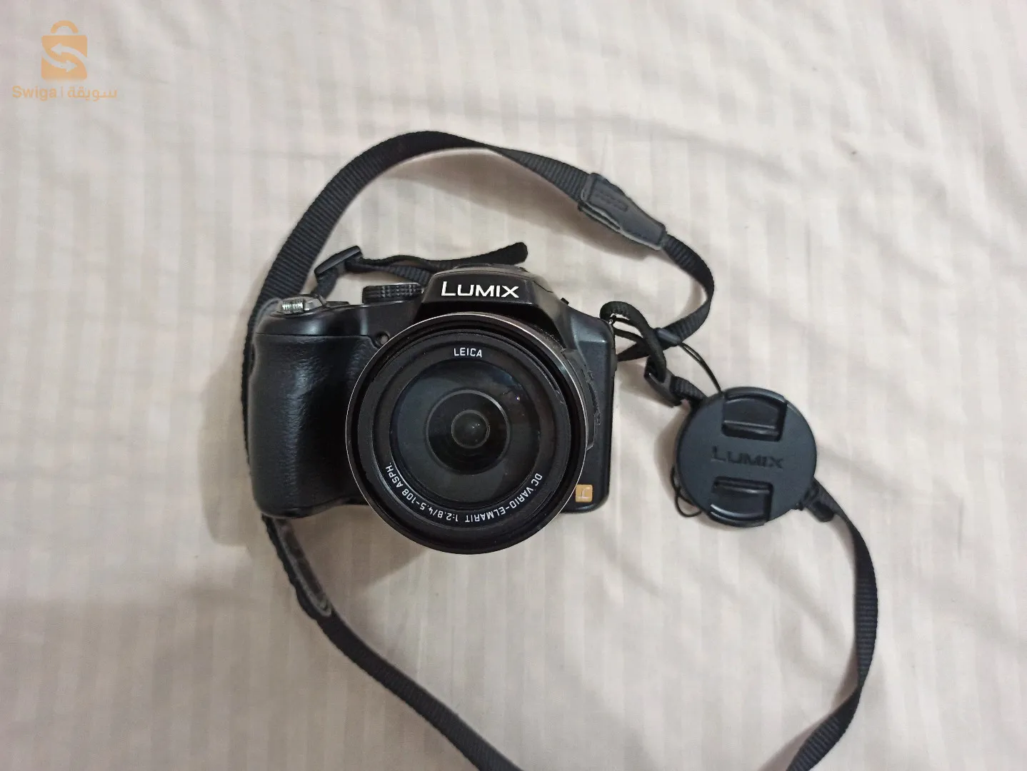 lumix fz200 في حالة جيدة مع بطاريتين وشاحن أصلي