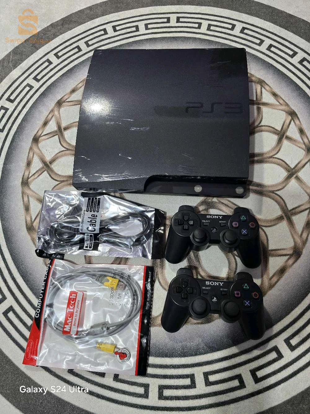 ps3 slim 500gb maflchi avec 2 manett