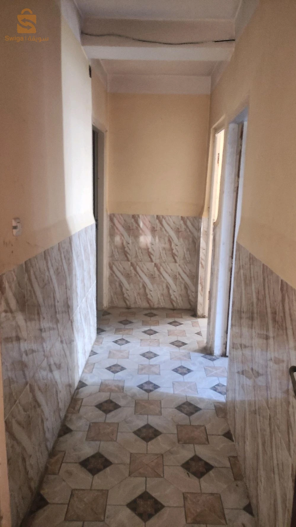 شقة سكنية مجهزة بالغاز والماء والكهرباء 
في حي تالنجاست (رقم10)