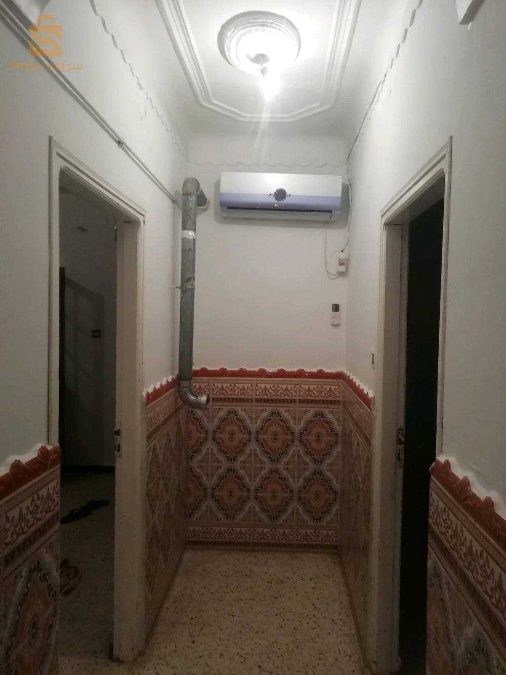 f4 la clim chauf bain la citarne de 1000litre  niveau de villa 1 étage bon voisinage 2 façade