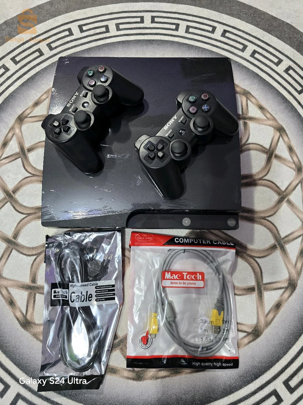 ps3 slim 500gb maflchi avec 2 manett