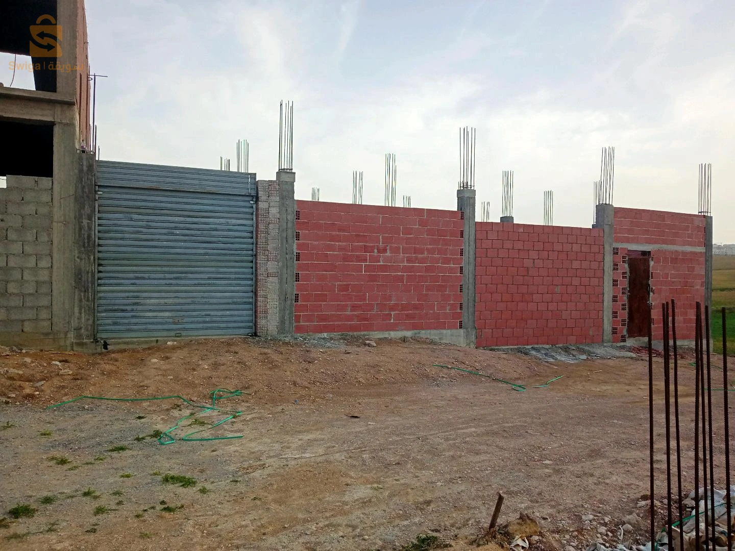 قرية بلحرش مقابل المطار