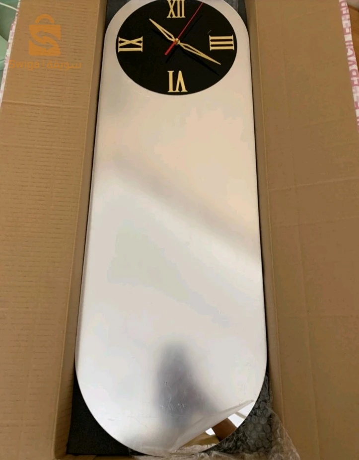 Horloge Murale Silencieuse Forme Oval Chiffre Romain 90x35cm