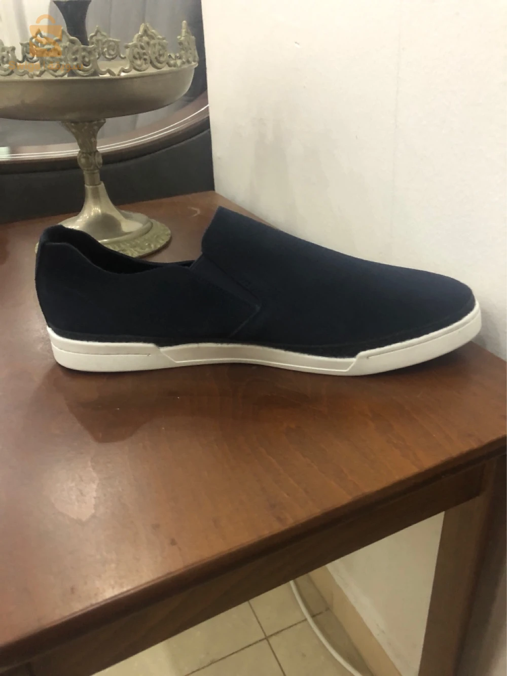chaussures sketchers original la pointure 44 la couleur bleu foncé et merci
