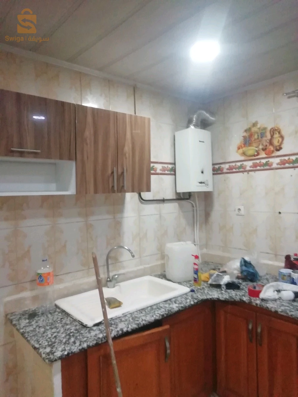 f4 la clim chauf bain la citarne de 1000litre  niveau de villa 1 étage bon voisinage 2 façade