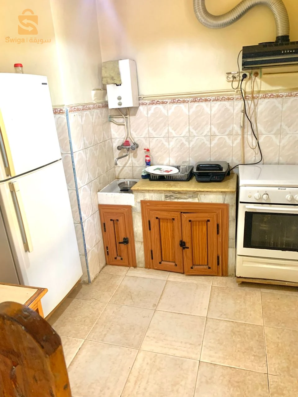 appartement F4 RDC niveau de Villa coloniale+jardin+garage