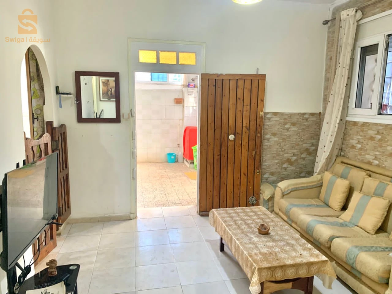 appartement F4 RDC niveau de Villa coloniale+jardin+garage