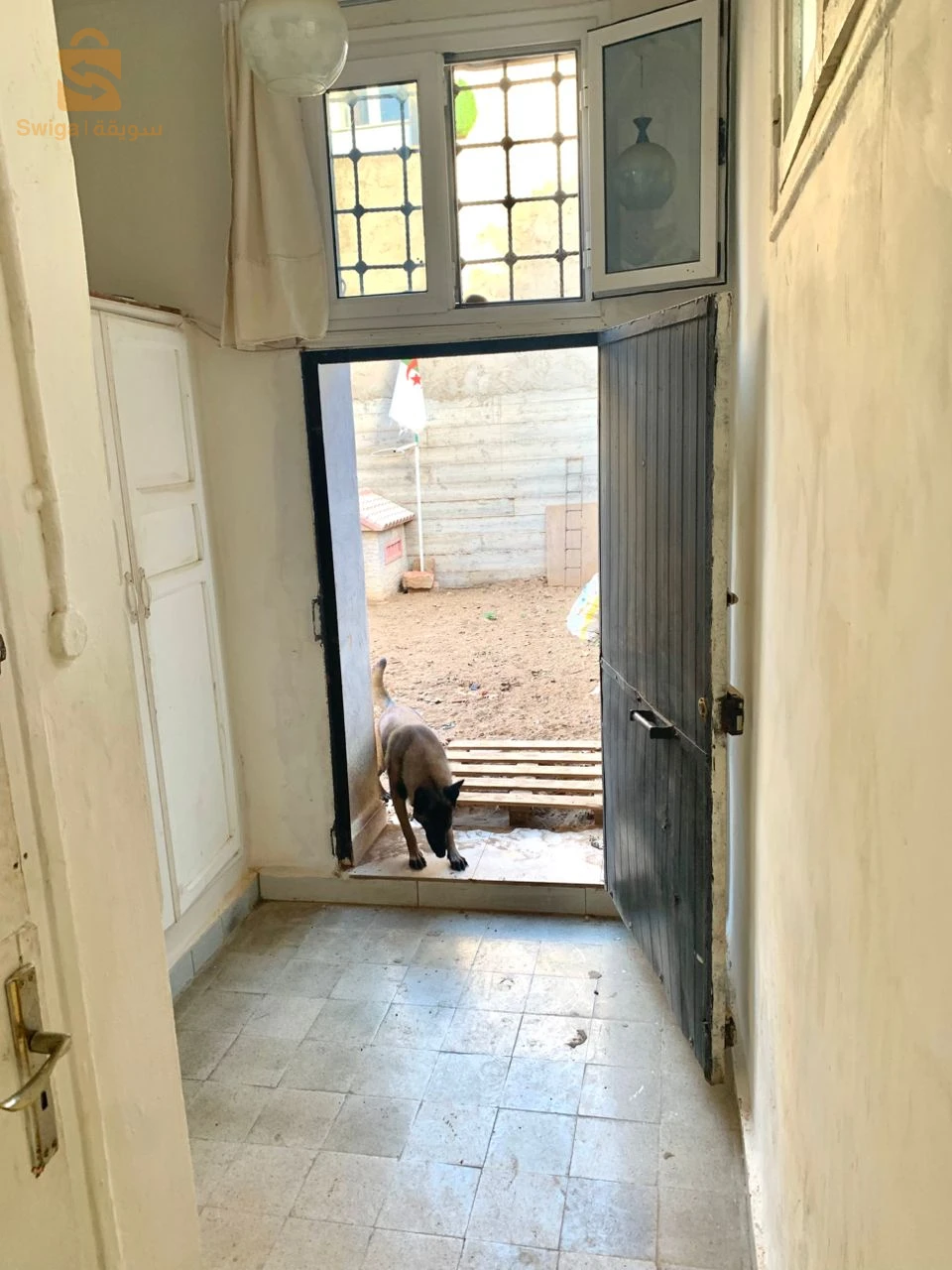 appartement F4 RDC niveau de Villa coloniale+jardin+garage