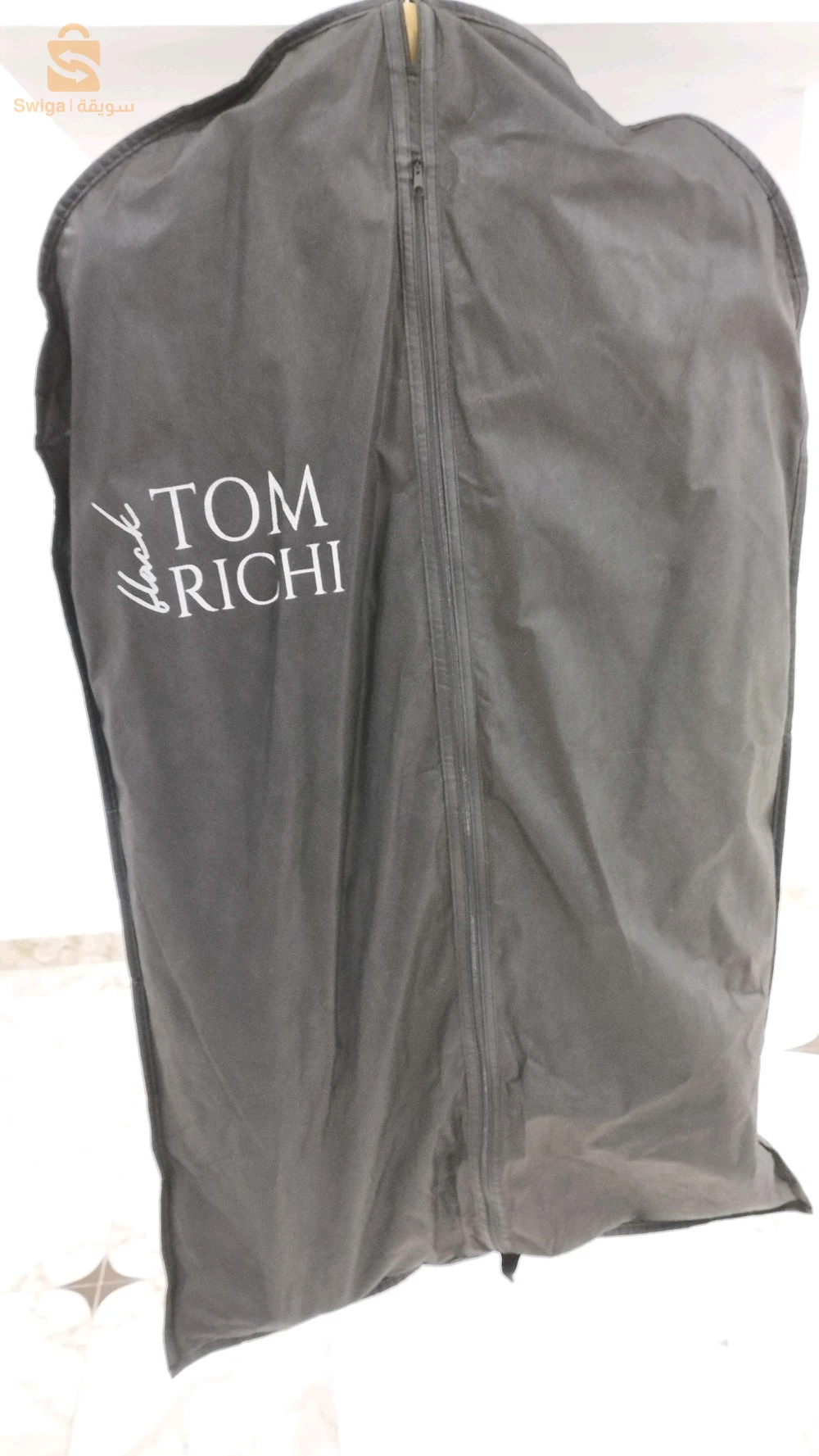 TOM RICHI