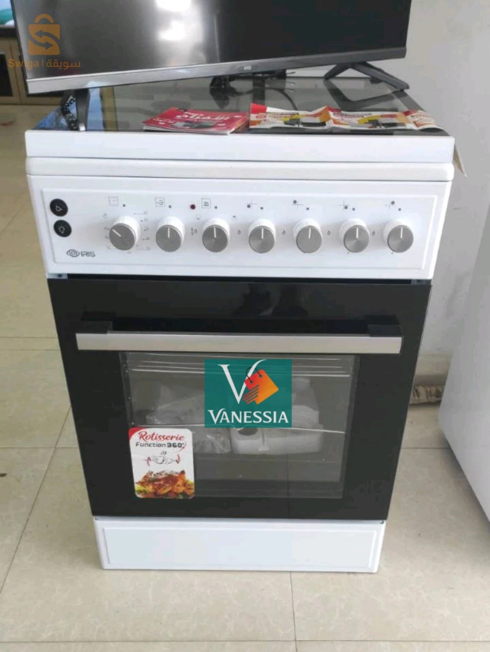 Cuisinière marque iris couleur blanche 4 feux