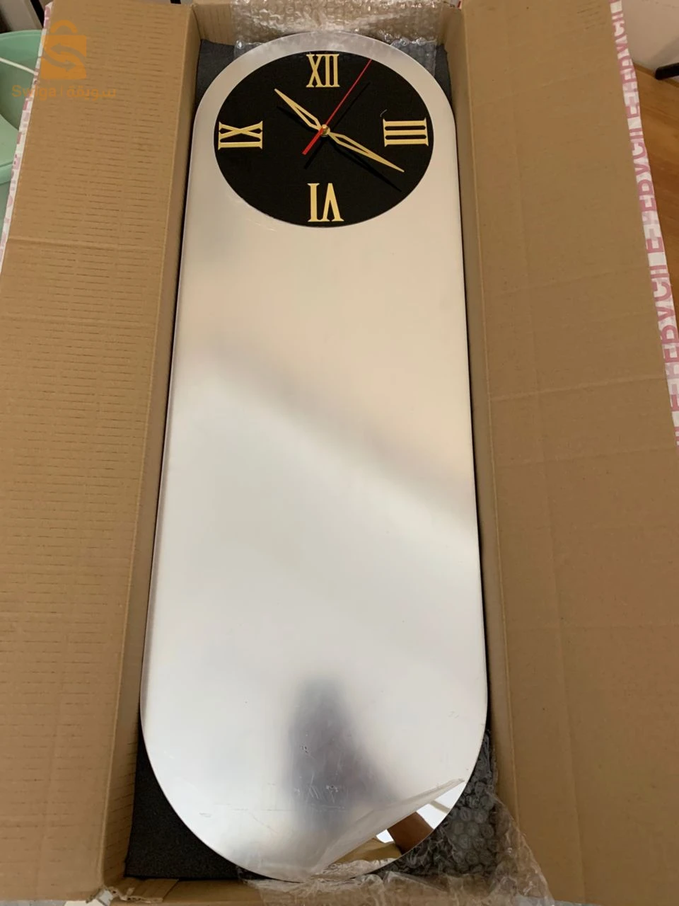 Horloge Murale Silencieuse Forme Oval Chiffre Romain 90x35cm