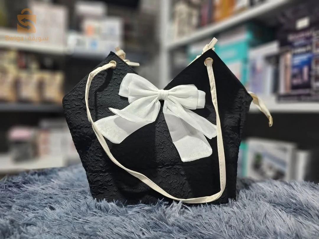 مع Sac Seau avec Nœud، خلي كل خرجة ديالك مميزة! ما تخليش الفرصة تفوتك وكوني ديما قدام الموضة! ✨