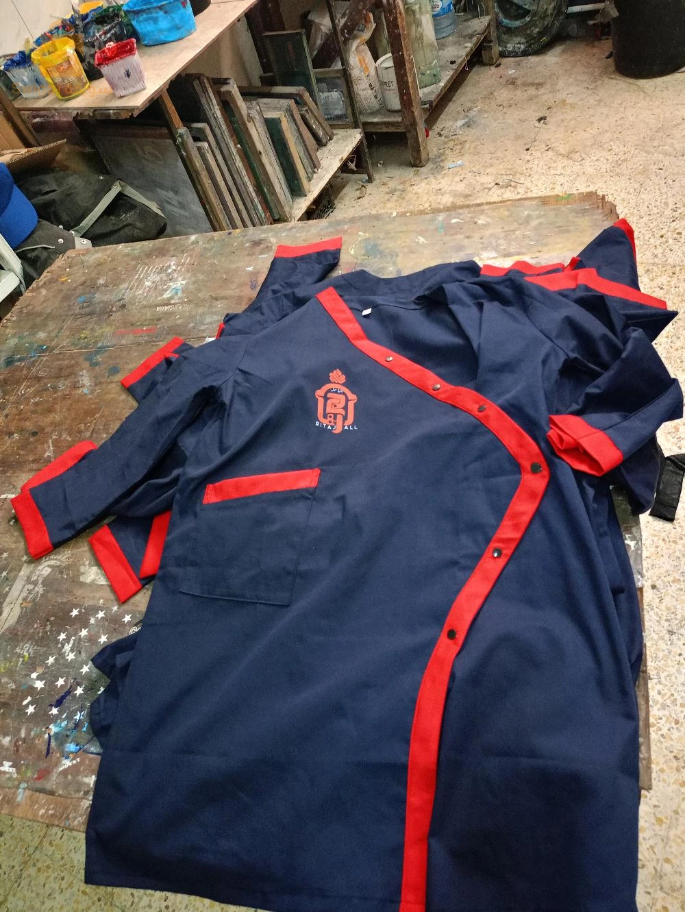 بيع و طباعة ملابس العمل 0557718678