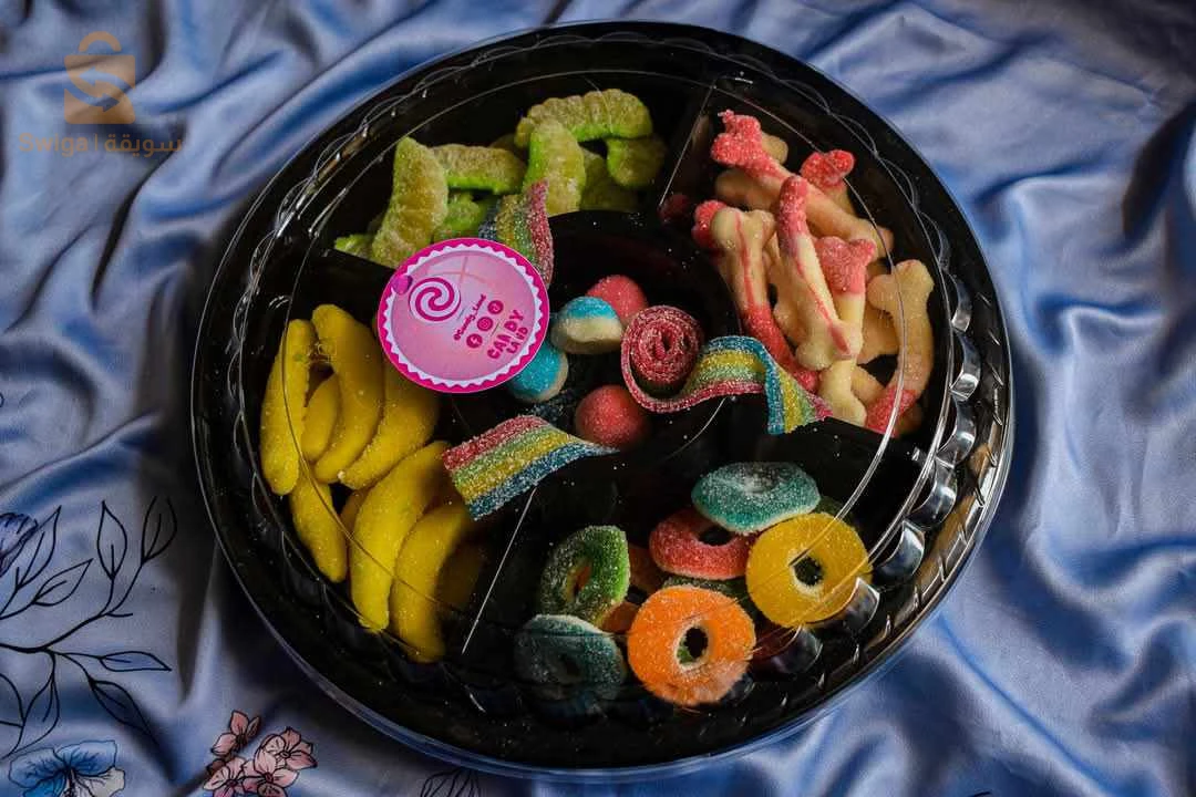 حلوى لذيذة حلوة وحامضة على شكل علبة دائرية 🎁