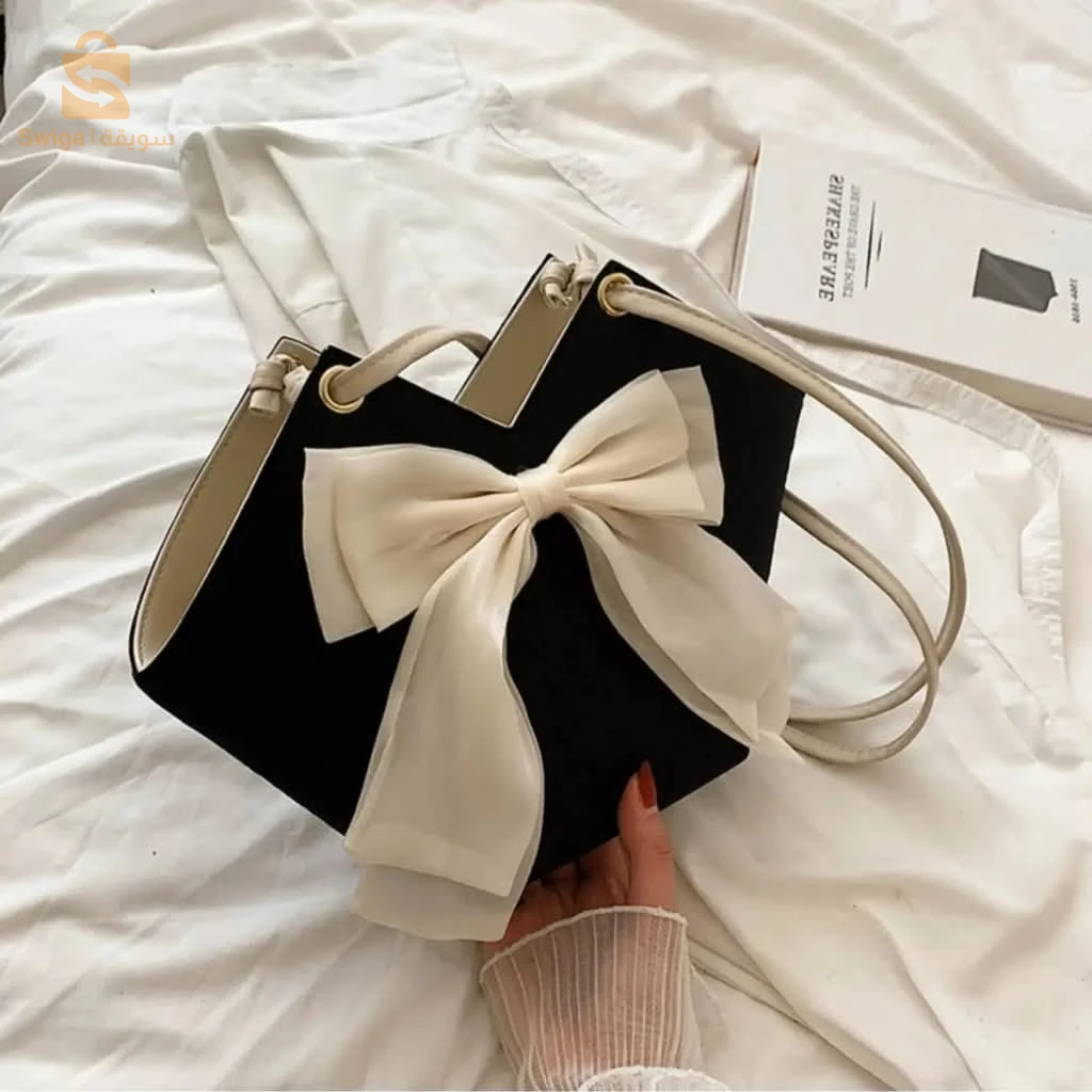 مع Sac Seau avec Nœud، خلي كل خرجة ديالك مميزة! ما تخليش الفرصة تفوتك وكوني ديما قدام الموضة! ✨