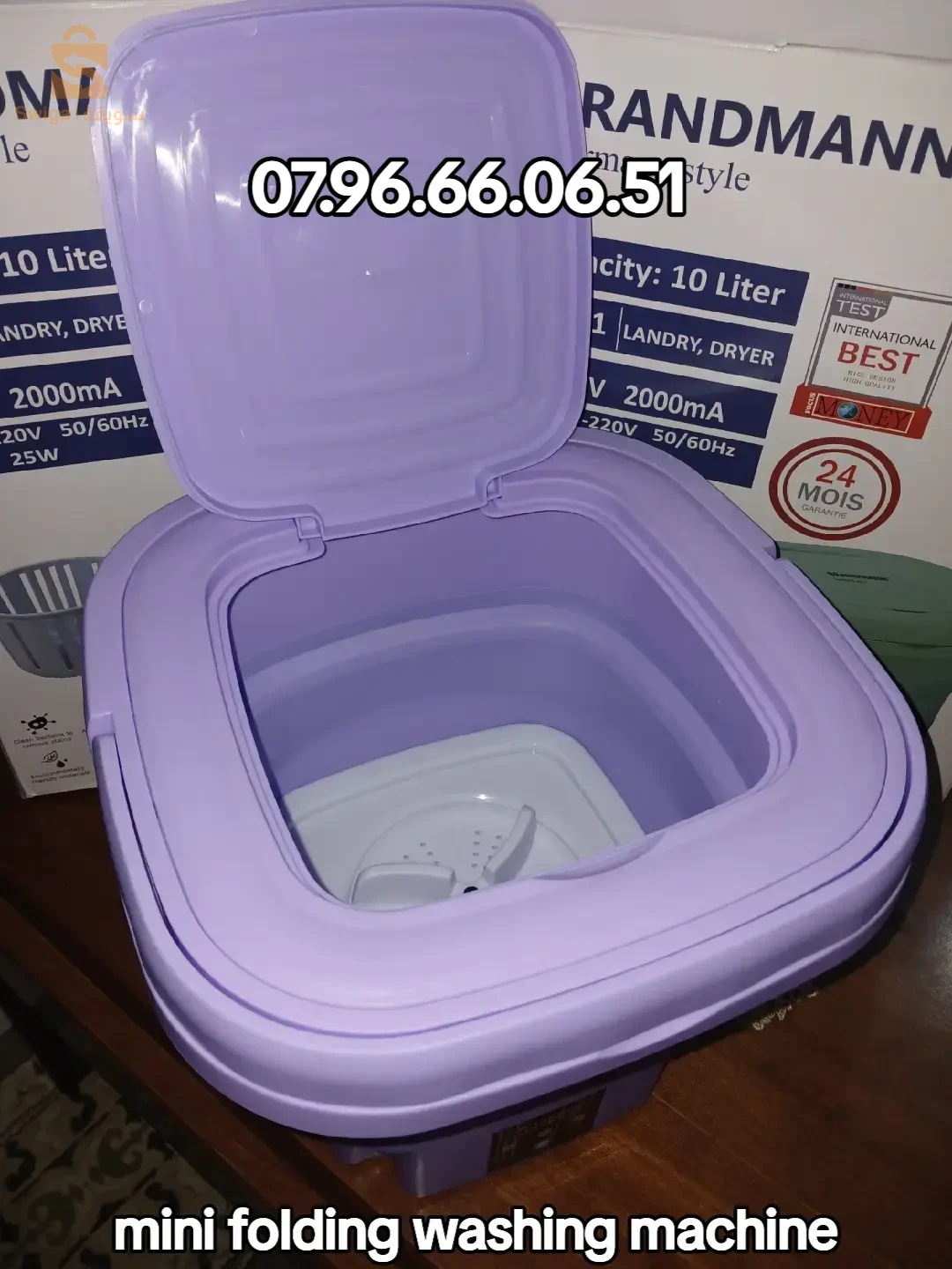 الغسالة الكهربائية القابلة للطي