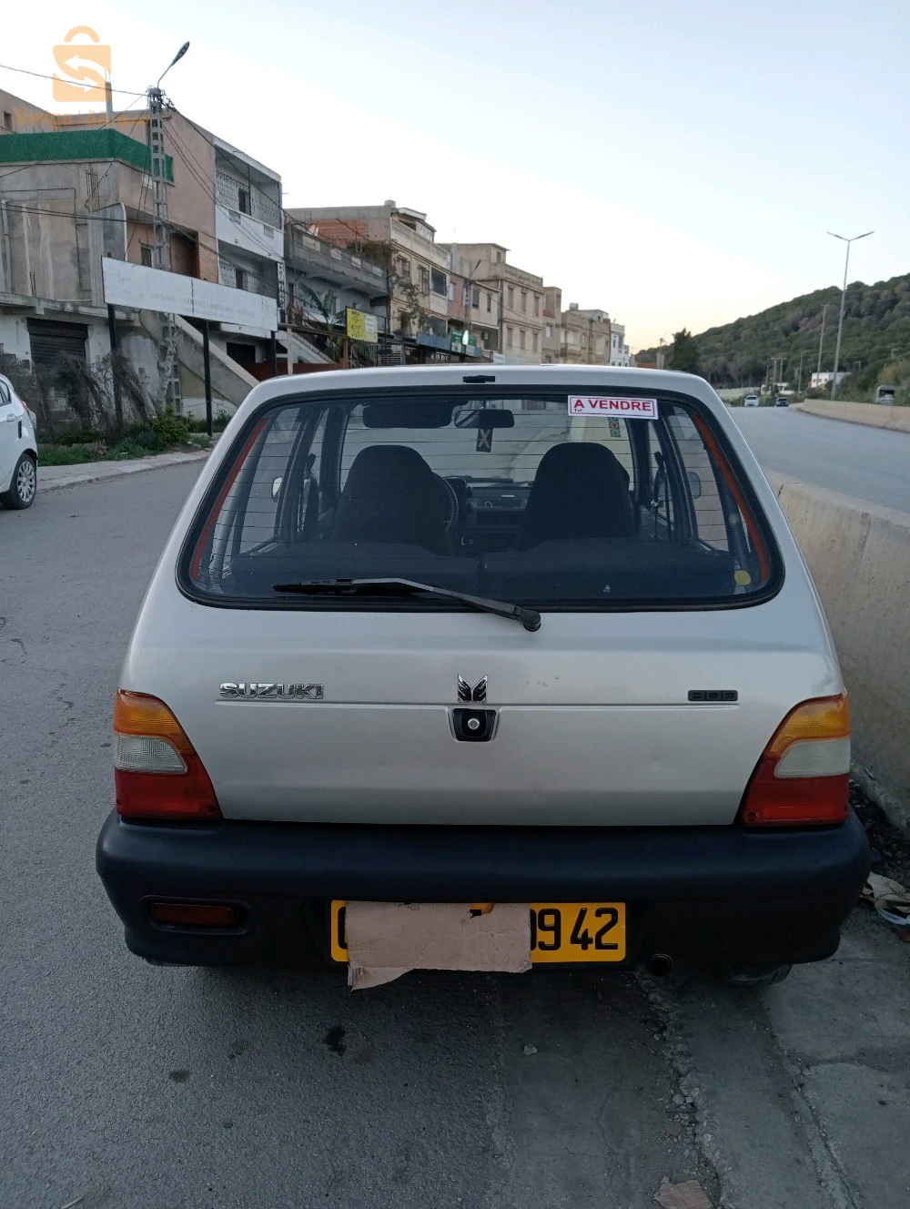 للبيع سيارة ماروتي نقية فيها لال و باب صبيغة نقاوة