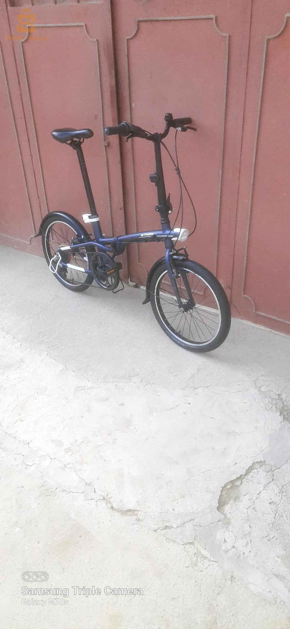 Vélo b'twin pliant tilt 500