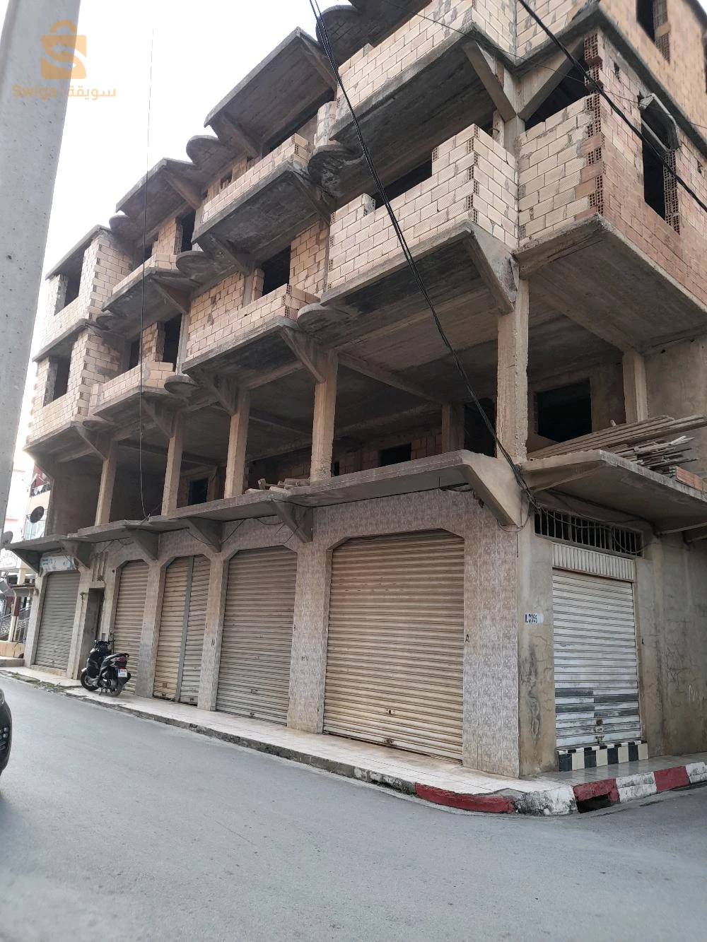 vente maison semi finie,R+3 et 7locaux à bejaia centre ville d'une superficie de 435 mètres carrés bâti ,n; 0657267335 / 0561541612