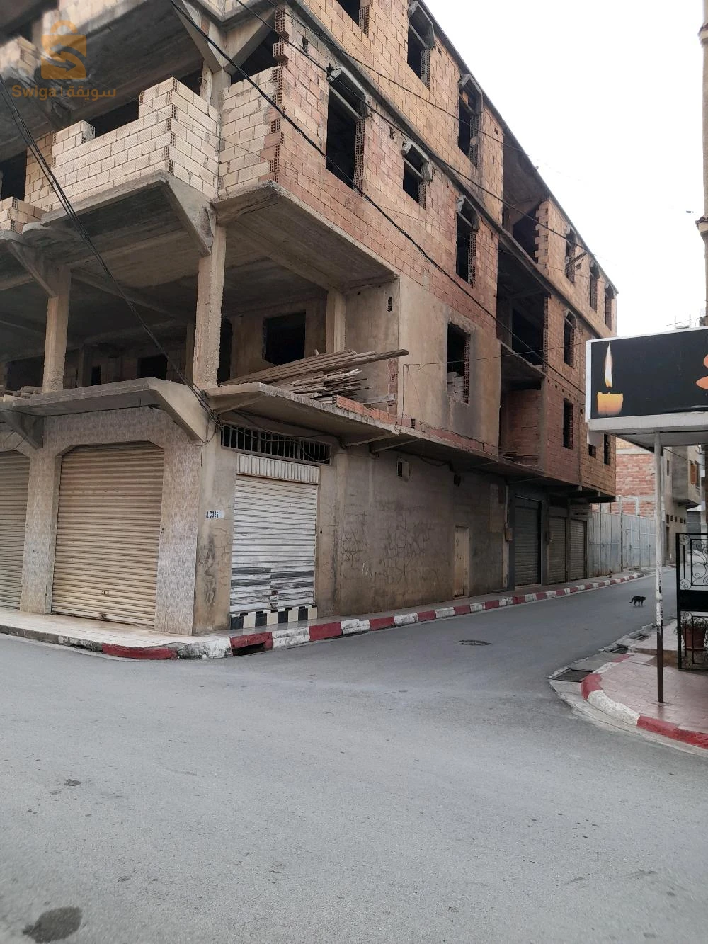 vente maison semi finie,R+3 et 7locaux à bejaia centre ville d'une superficie de 435 mètres carrés bâti ,n; 0657267335 / 0561541612