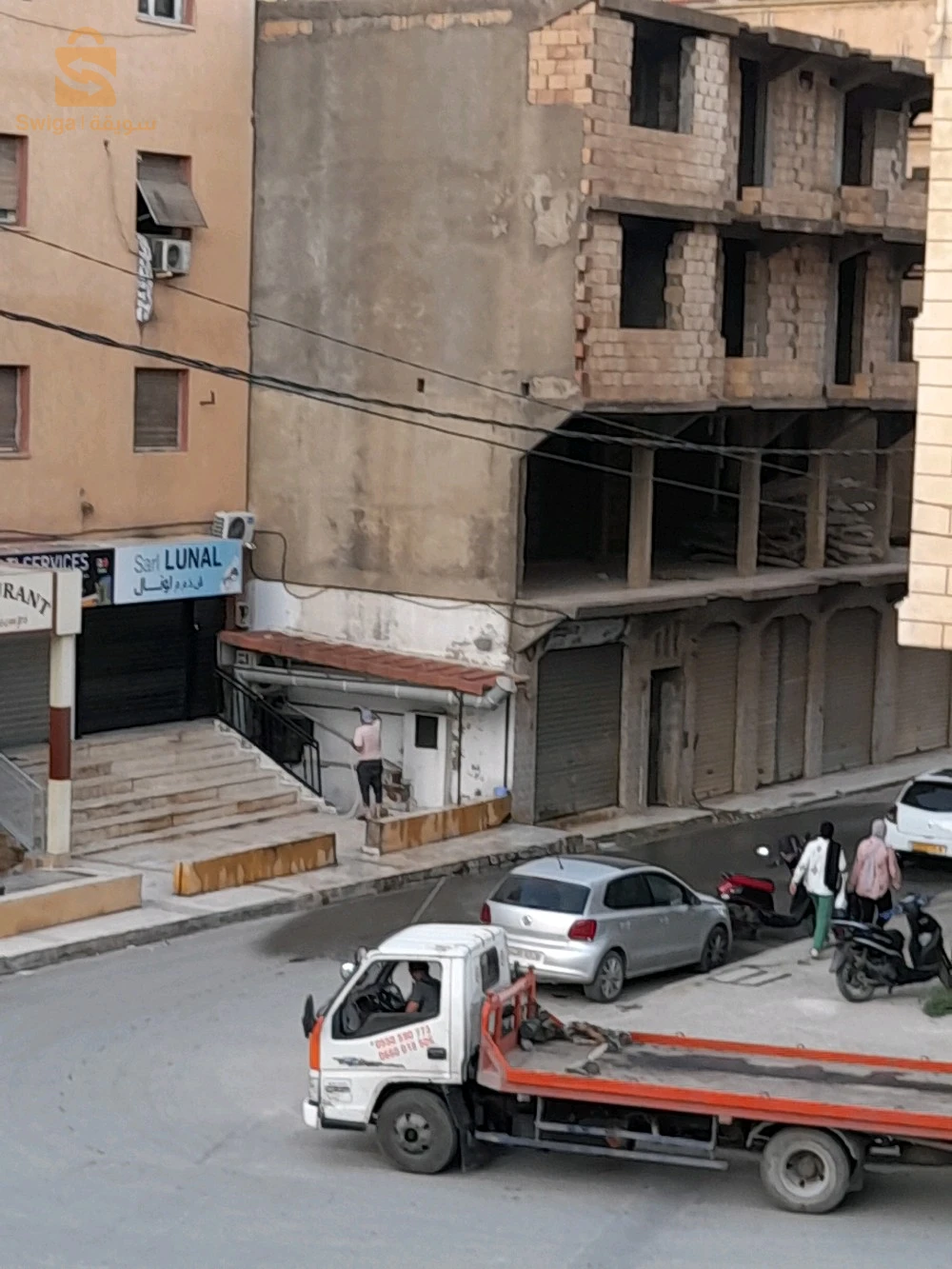 vente maison semi finie,R+3 et 7locaux à bejaia centre ville d'une superficie de 435 mètres carrés bâti ,n; 0657267335 / 0561541612