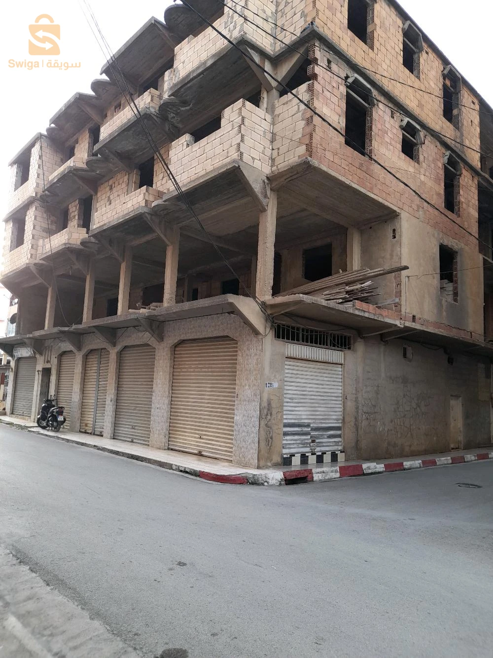 vente maison semi finie,R+3 et 7locaux à bejaia centre ville d'une superficie de 435 mètres carrés bâti ,n; 0657267335 / 0561541612