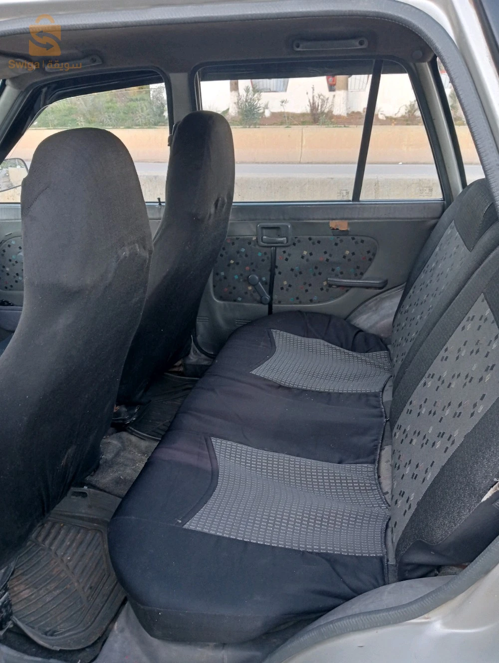 للبيع سيارة ماروتي نقية فيها لال و باب صبيغة نقاوة