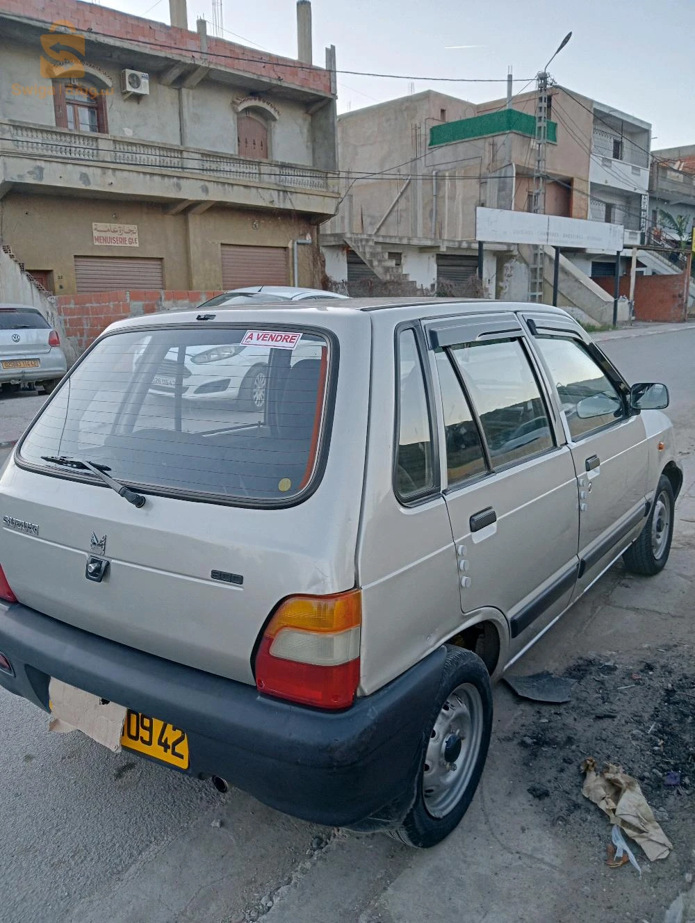للبيع سيارة ماروتي نقية فيها لال و باب صبيغة نقاوة
